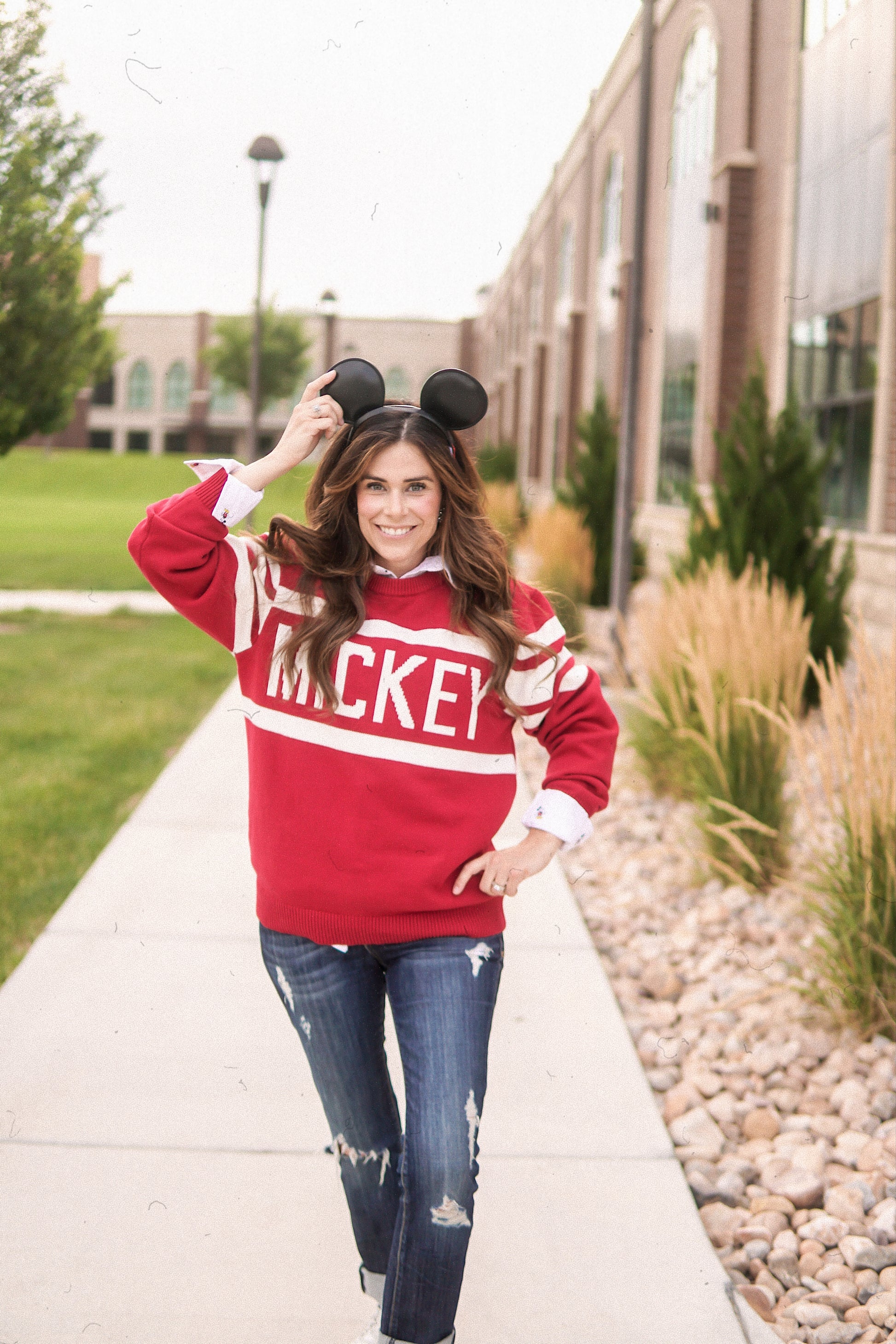 Mickey Spirit Sweater perfect for cold days in the parks. With striping on the sleeve this knit top is sporty and stylisih.